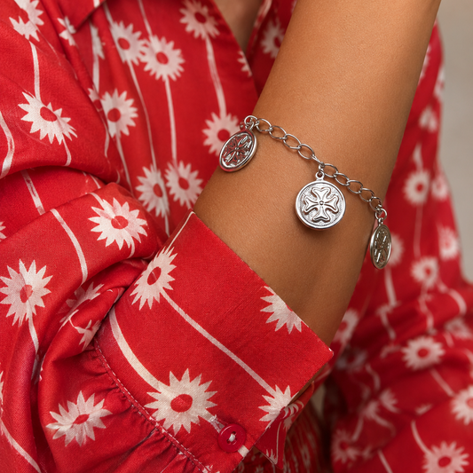 Silver Plated Lucky Clover Charm Bracelet with Embossed Medallions